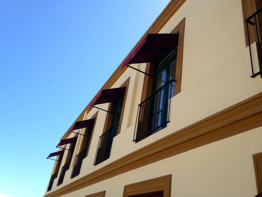 Real Hotel Lujan Экстерьер фото