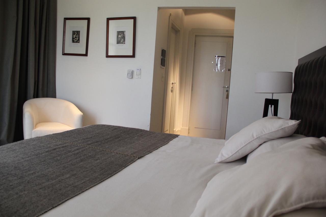 Real Hotel Lujan Экстерьер фото