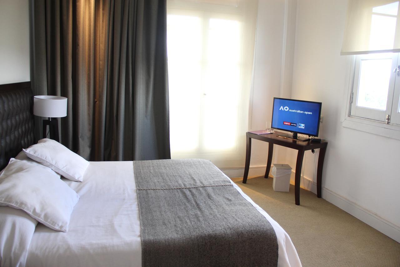 Real Hotel Lujan Экстерьер фото