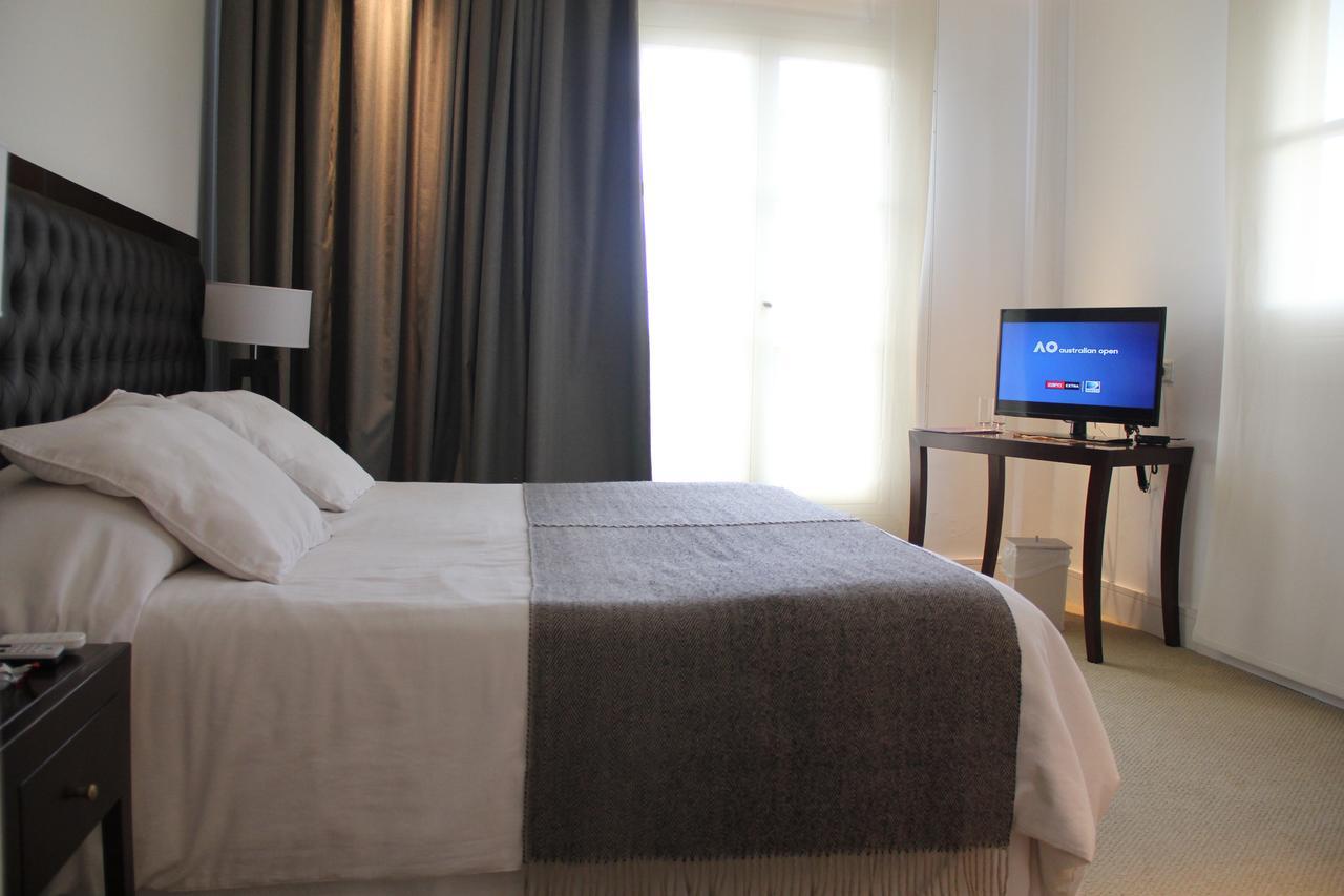 Real Hotel Lujan Экстерьер фото