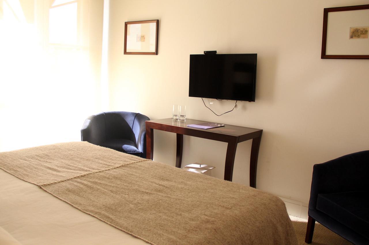 Real Hotel Lujan Экстерьер фото
