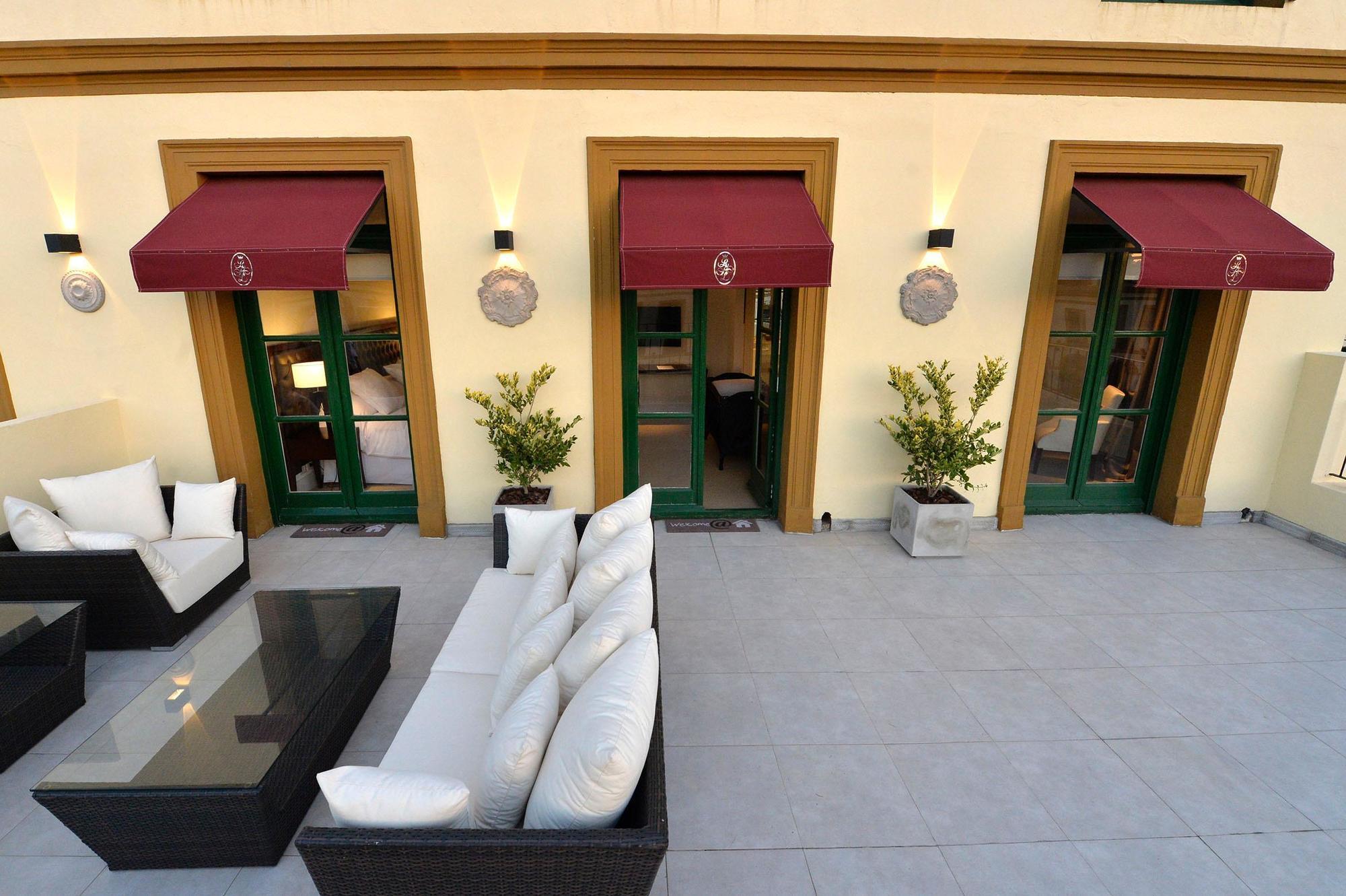 Real Hotel Lujan Экстерьер фото